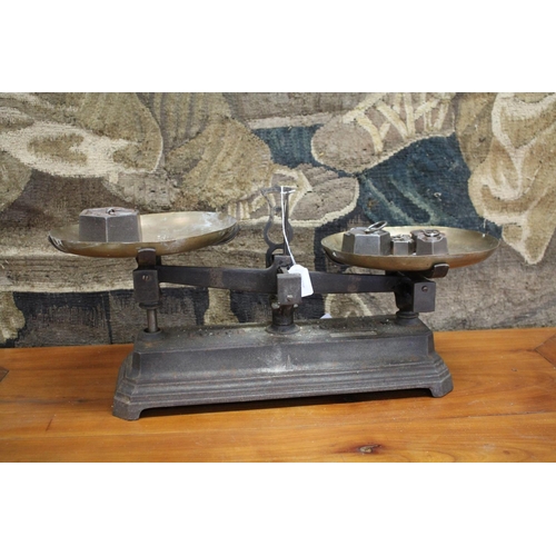 304 - Set of antique French iron weighing scales and weights, approx 55cm W