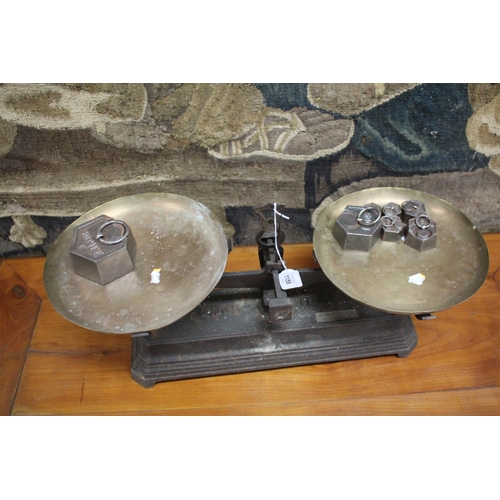 304 - Set of antique French iron weighing scales and weights, approx 55cm W