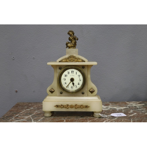 111 - Small marble clock, movement loose, missing back plate with a loose finial, unknown working conditio... 