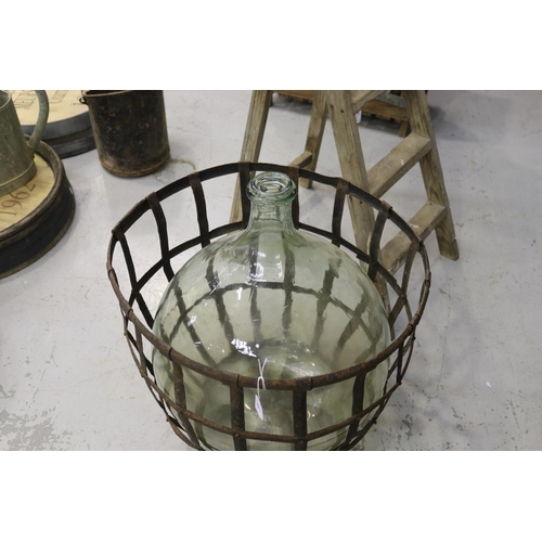 121 - Large French handblown glass winemakers bottle with metal basket cage, approx 60cm H x 55cm Dia