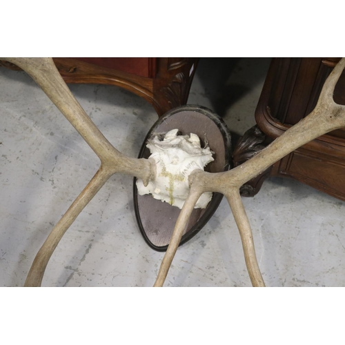 136 - Set of impressive antlers, approx 90cm H x 92cm W