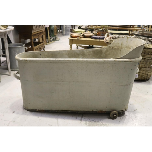 243 - Old French bathtub, missing wheels, approx 76cm H x 128cm L x 59cm W