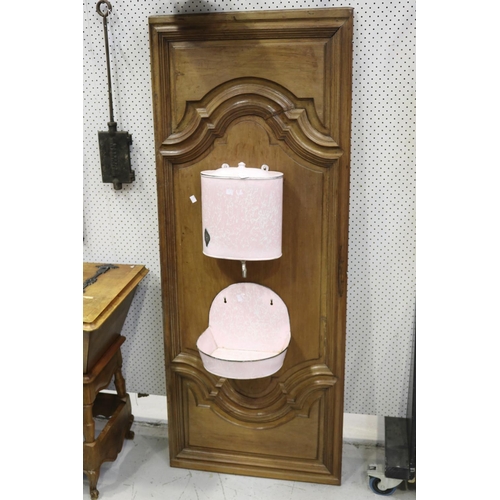 276 - French pink enamel cistern mounted to antique French door, approx 169cm H x 67cm W