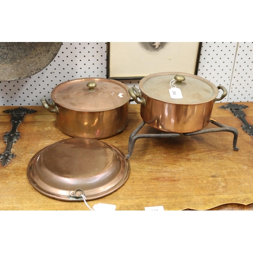 280 - Two copper lidded pots, iron rack and pan, approx 24cm Dia and smaller (4)