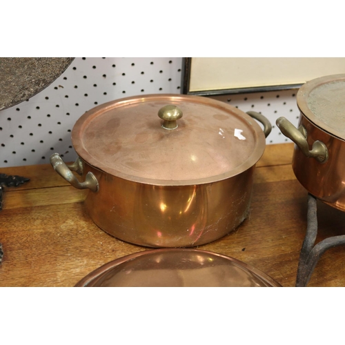 280 - Two copper lidded pots, iron rack and pan, approx 24cm Dia and smaller (4)