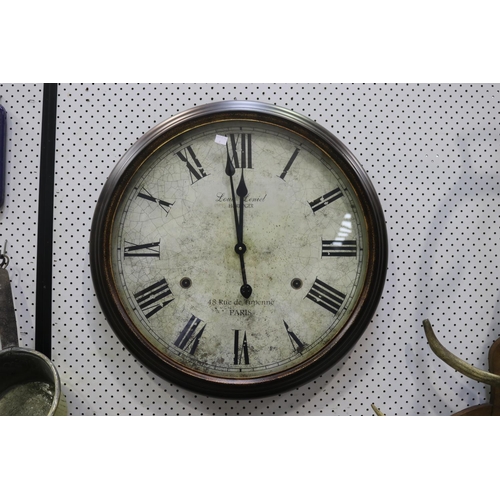 326 - Large decorative circular clock, marked 'Louis Leniel Horloger, 48 Ru de Tupenne, Paris', no key and... 