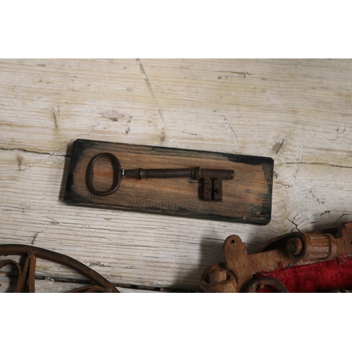 444 - Three old keys, one mounted to a carved wooden decorative panel, large hand made example, approx 53c... 