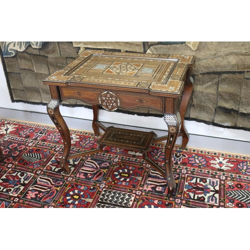 10 - Traditional Moroccan inlaid table with matching armchairs, well appointed inlay, table approx 78cm h... 