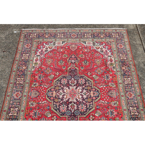160 - Persian Tabriz geometric hand knotted carpet, approx 298cm x 195cm