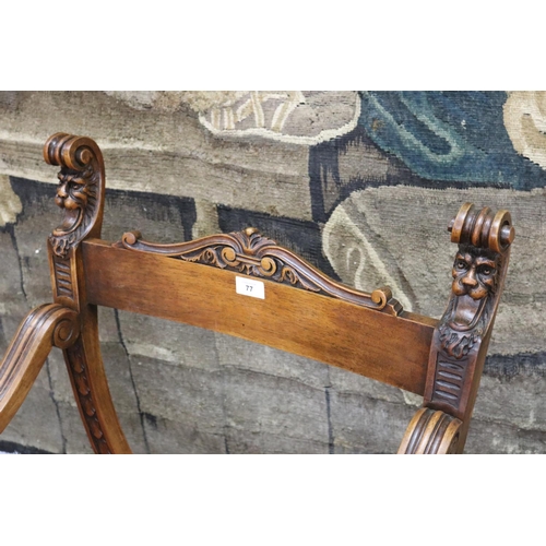 77 - Italian walnut savonarola / X frame armchair, carved lion mask decoration