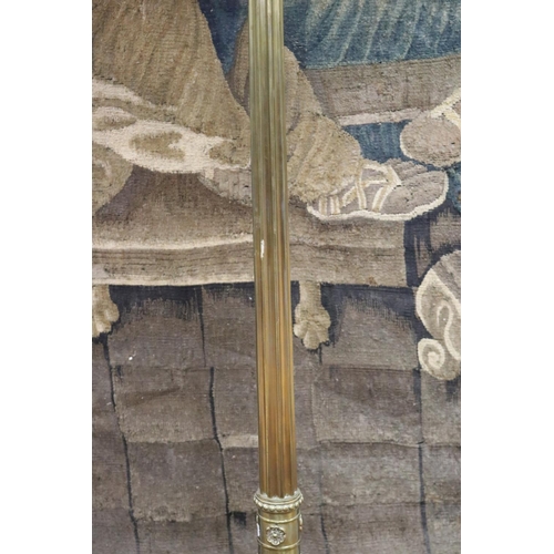 86 - Antique French cast brass standard lamp, the base standing on griffin support legs, well cast, unkno... 