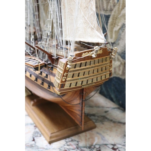 194 - HMS Victory model on stand, with plaque to base, well constructed, approx 85cm H x 107cm L
