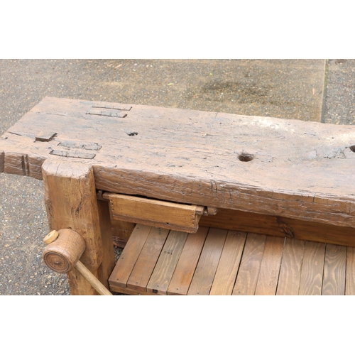 84 - Antique French long low work bench, with bulldog clip & mallet, approx 68cm H x 235cm W x 42cm D