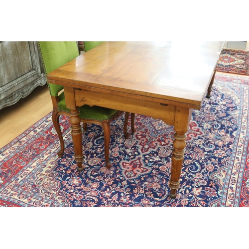 153 - Most impressive antique French fruit wood drawer leaf dining table, standing on turned legs, approx ... 