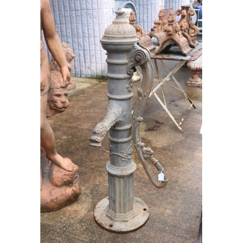 169 - Antique French cast iron monkey tail pump with dolphin head spout, approx 114cm H