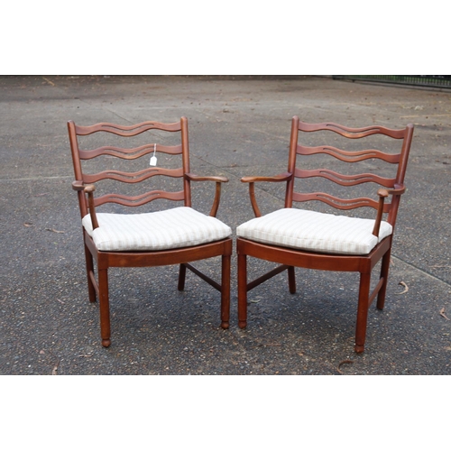 181 - Pair of walnut armchairs, model 1755 designed by Ole Wanscher for Fritz Hansen, Denmark 1945, with s... 