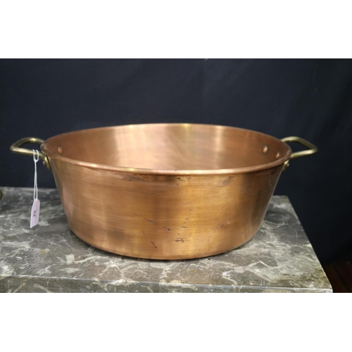 52 - French twin handled copper pan, brass handles, approx 14cm H x 38cm Dia (ex handles)