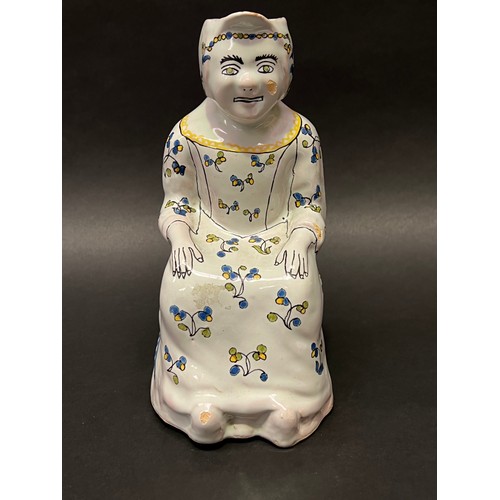 33 - Antique French Faience seated figure jug, approx 25cm H