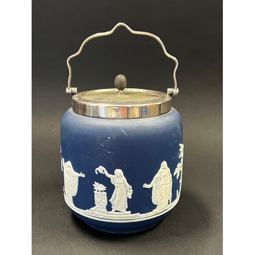 54 - Wedgwood jasper lidded biscuit barrel, along with two jasper jugs, approx 16cm H and shorter (3)
