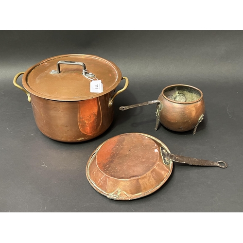 115 - Three copper pieces, lidded saucepan, antique fry pan and footed saucepan (3)