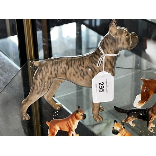 210 - A pack of dogs, to include two boxer dogs and others, some damages, approx 14cm H and smaller