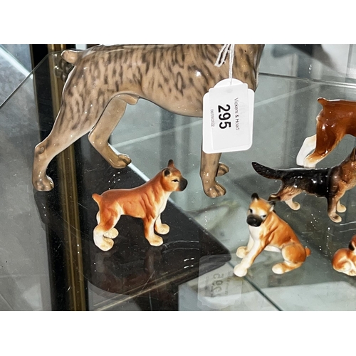 210 - A pack of dogs, to include two boxer dogs and others, some damages, approx 14cm H and smaller