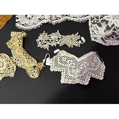 216 - Assortment of a Maltese and other lace etc (No measurements for this lot) (8)