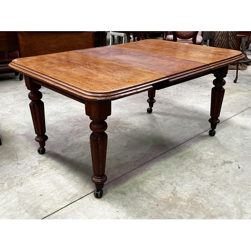 238 - Antique turned leg extension dining table, with extra leaf, approx 69cm H x 145cm W (leaf fitted) x ... 