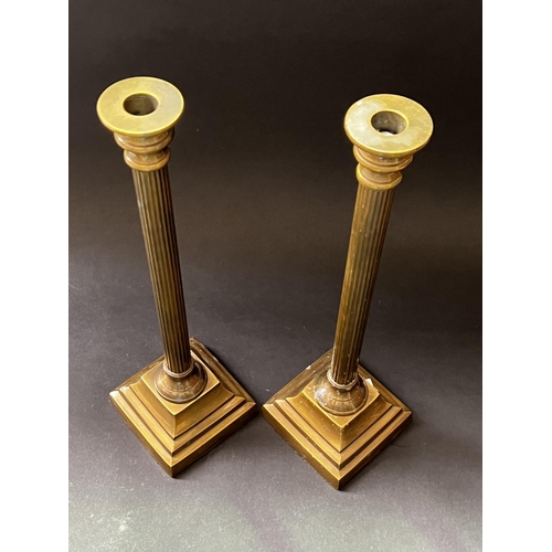63 - Pair of brass column candlesticks, approx 41cm H (2)