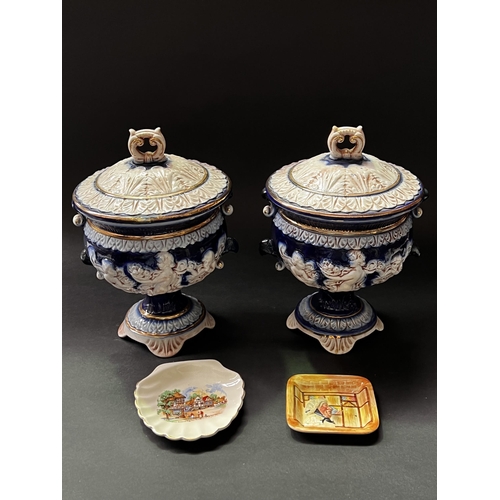71 - Pair of blue and gilt Italian ceramic lidded urns and two pin dishes, approx 30cm H and smaller (4)