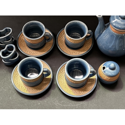 99 - Thailand teaset with sugar, four cups and saucers, napkin rings, approx 19cm H and shorter