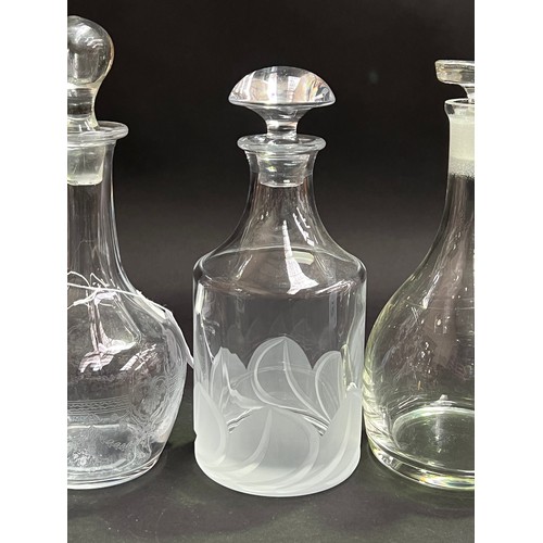 243 - Four decanters, approx 26cm H and shorter