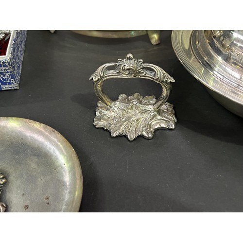 287 - Assortment of silver plate to include an Elkington sugar nip, approx 33cm W and smaller