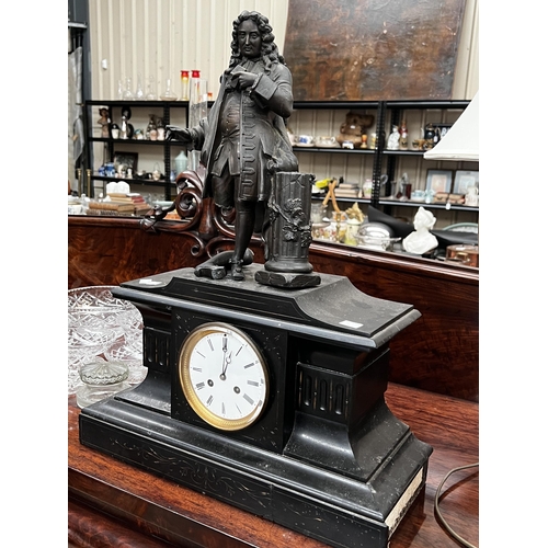 230 - Antique black slate figural clock (figure leg A/F, slate side section missing) has pendulum but no k... 