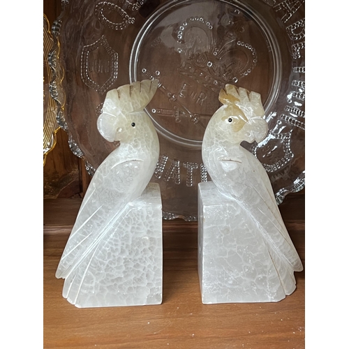 275 - Pair of cockatoo bookends and a book paperweight, approx 15cm H and shorter