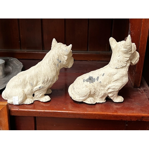 281 - Pair of spelter Scottie dogs, approx 18cm H x 20cm W and shorter (2)