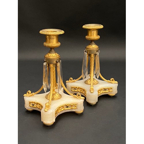 12 - Pair of antique gilt bronze and alabaster candlesticks, with applied drops, each approx 20cm H (2)