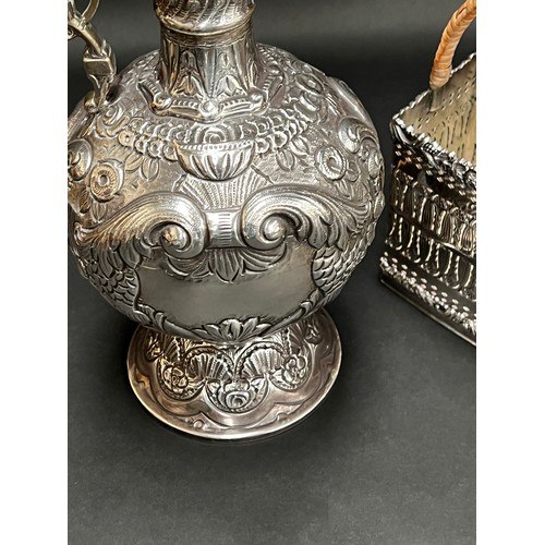 84 - Good quality Barker & Ellis silver plate wine cradle, along with a repousse silver plate claret jug ... 