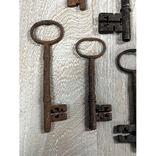 25 - Assortment of large antique iron keys