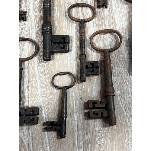 25 - Assortment of large antique iron keys