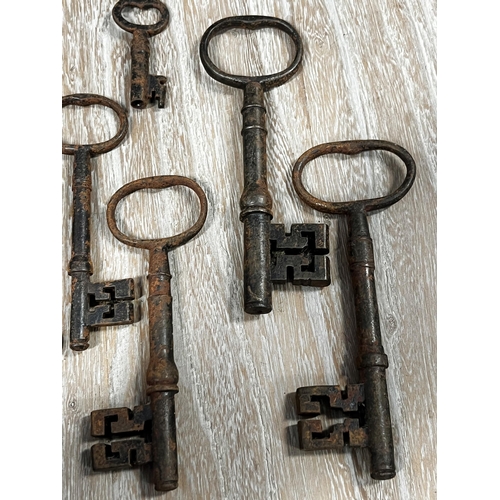 25 - Assortment of large antique iron keys