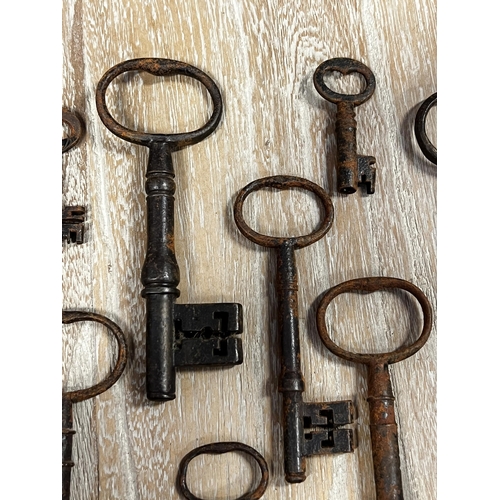 25 - Assortment of large antique iron keys