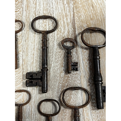 25 - Assortment of large antique iron keys