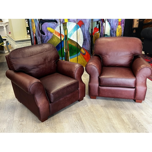 40 - Pair of custom David Jones Moran brown leather lounge arm chairs (2)