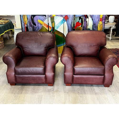 40 - Pair of custom David Jones Moran brown leather lounge arm chairs (2)