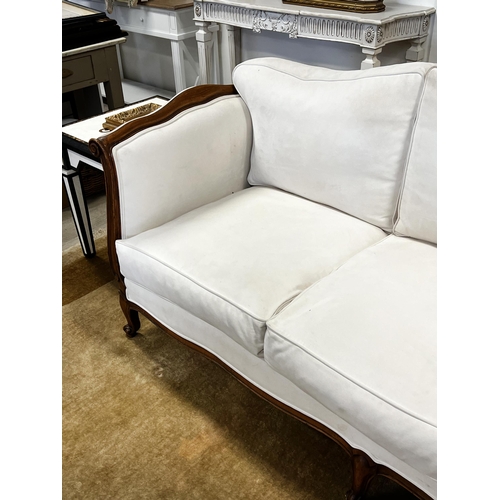 74 - French Louis XV style double ended settee, upholstered in cream suede fabric by Warwick, approx 222c... 