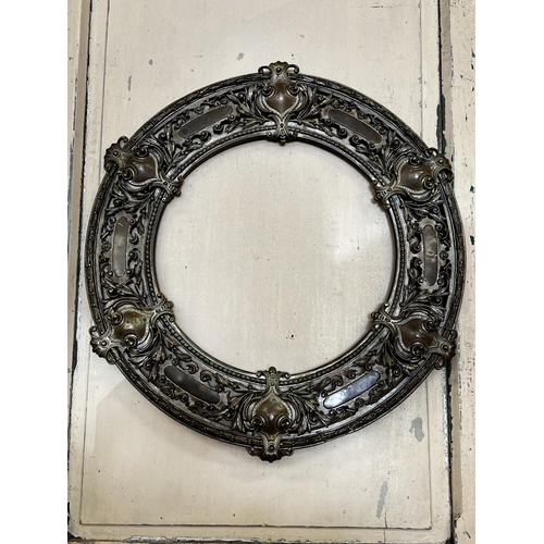 77 - Antique bronze pierced circular frame, approx 56cm Dia