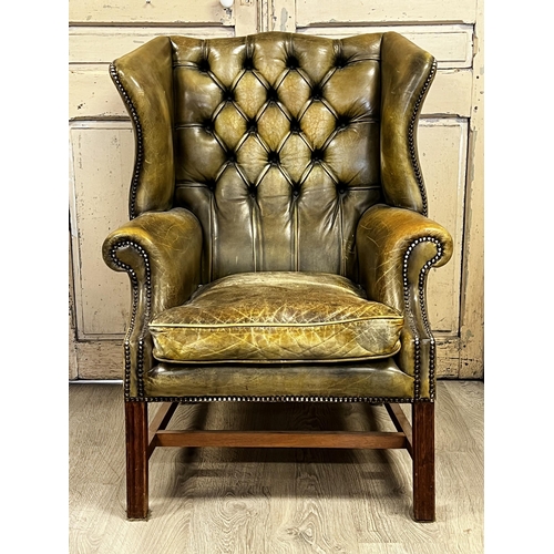 78 - English Georgian revival green leather wing arm chair