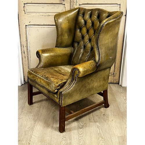 78 - English Georgian revival green leather wing arm chair