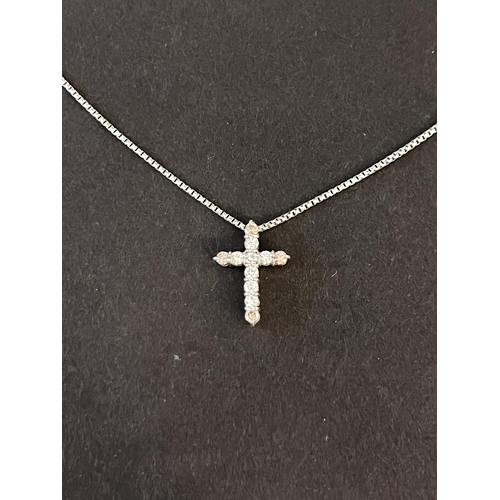 128 - 18kt White Gold Chain with 18kt White Gold Cross set with 7 round brilliant cut diamonds (0.34ct) an... 